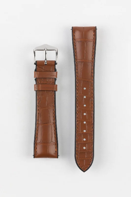 high-end pilot chronograph watches-Hirsch IAN Louisiana Alligator Hide Performance Watch Strap in GOLD BROWN